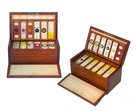 Two Victorian mahogany cases of microscope slides. The flush boxes, with hinged lids and fronts, containing 10 and 12 trays, 