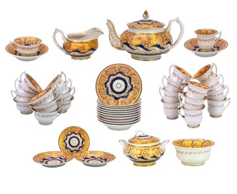 An English porcelain tea and coffee set. Circa 1840, with salmon pink, blue and gilt decoration, comprises teapot and cover, 