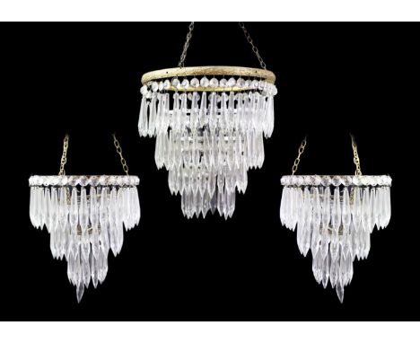 A brass and chrome mounted cut glass chandelier. Early 20th century, with spear drops, height 26cm, diameter of the top 26cm,