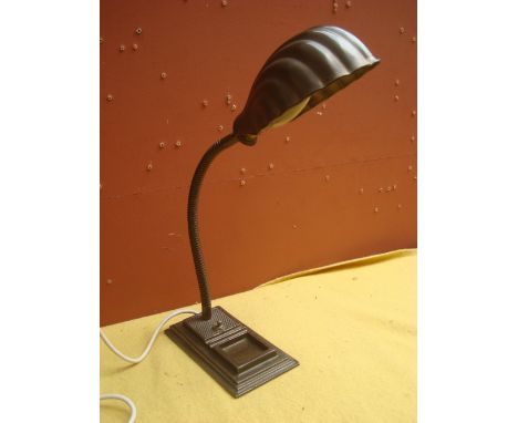 A 1930's shell shaded desk lamp with architectural heavy base. 