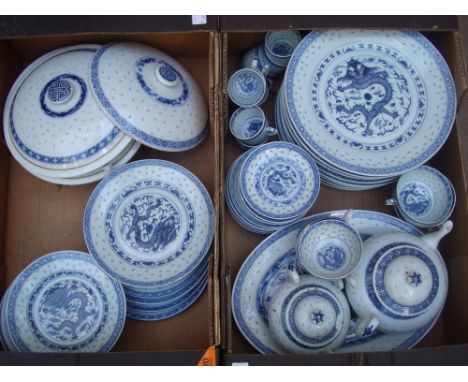 A mid 20th Century Chinese blue and white rice grain part dinner tea and coffee service, each piece decorated to centre with 