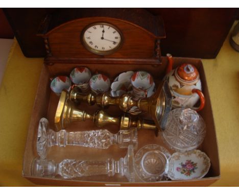 A small tea set, cut glass candlesticks, 19th Century brass candlesticks, an oak cased mantle clock. 