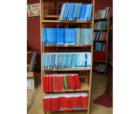 The Air Force List, The Navy List, The Army List (5 shelves), with Oxford and Cambridge University calendars (3 shelves). 