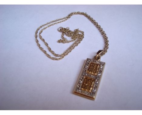 A 9 ct pendant and chain, approx 9.7g. 