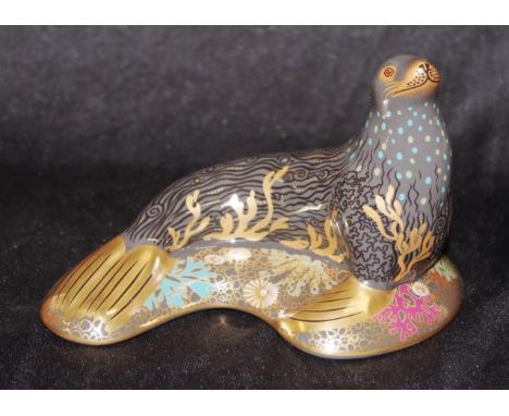 Royal Crown Derby "Sea Lion" paperweight with gold button seal to base, width 18cm approx