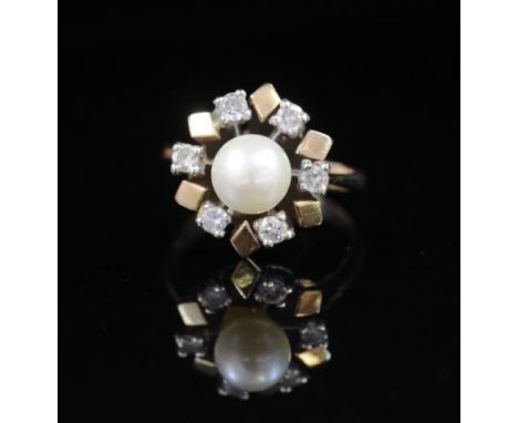 Pearl and diamond set yellow gold ring rubbed marks. Approx weight 3.8 grams, 6x 2.3mm round cut diamonds, 6mm round cultured