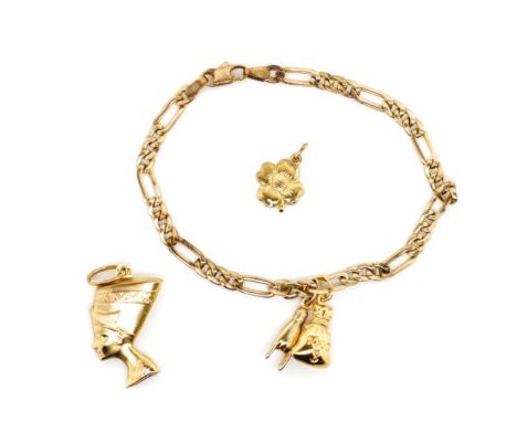 9ct yellow gold bracelet and charms marked 375 to Nefertiti, figaro bracelet figa hand, and swag bag. The flower is unmarked.