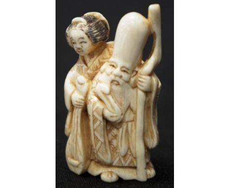 Early carved Ivory Longevity & attendant netsuke C1940, signed to base, height 7.5cm approx. NB.This item cannot be exported.