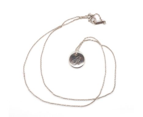 Tiffany sterling silver pendant and chain letter A disc charm both items marked. Approx chain length 46cm. With original box