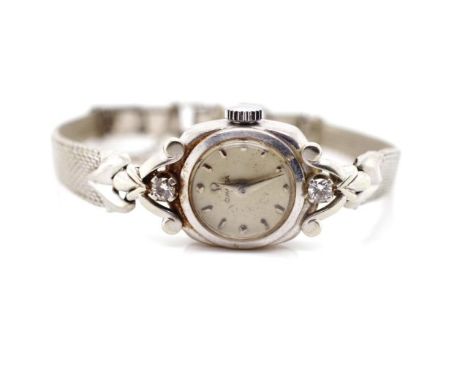 Ladies Omega 18ct white gold and diamond watch Marked 18ct Omega to back plate, marked seventeen jewels to manual wind moveme