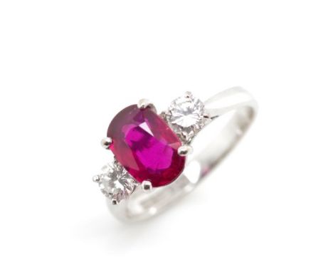 Ruby, diamond set 18ct white gold ring approx 2x 3.8mm round brilliant cut diamonds total diamond weight 0.40ct estimated. Ru
