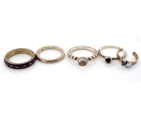 Five Pandora silver rings includes enamel "purple flower", and gemstone set pieces. ALE 925 marks. Approx ring size G-Q