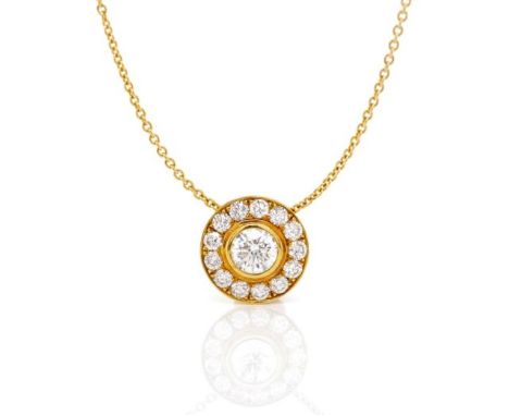 0.80ct diamond set 18ct halo pendant and chain marked 750 to chain. Approx length 44cm, weight 3.6 grams. center diamonds wei