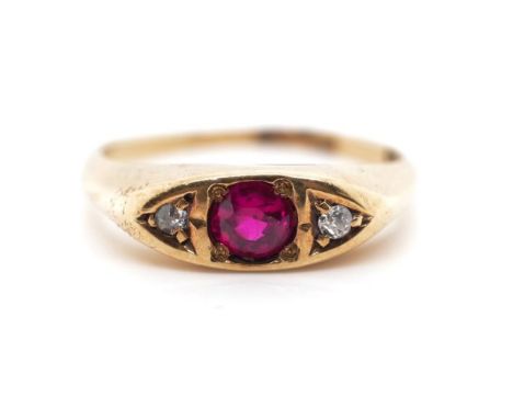 Antique diamond and 10ct rose gold ring also set with a red gemstone tests as ruby, marked 10k. Approx weight 2.7 grams, ring