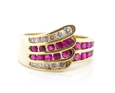 Diamond and ruby set 14ct yellow gold ring marked 14k 585. Approx weight 5.26 grams, ring size L-M
