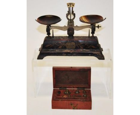 Antique Japanese cast metal balance scales with brass plaque &amp; horn bowls, height 15 cm together with cased weights (some