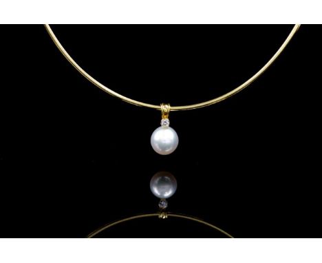 South Sea pearl, 18ct yellow gold and omega chain necklace. The enhancer pendant is set with approx 1x round brilliant cut di