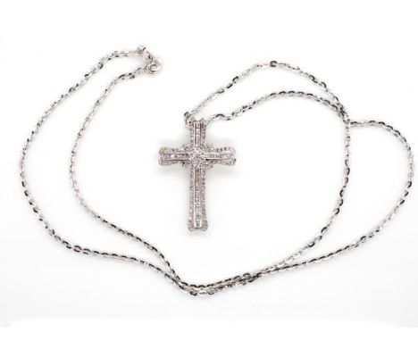 Diamond set 18ct gold cross and chain marked 750 approx total diamond weight 0.51ct, total weight of cross and chain 4.95 gra