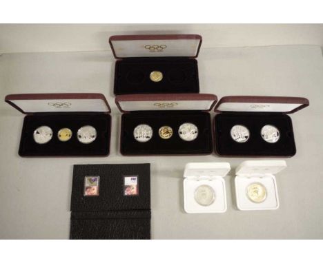 Eight Olympics commemorative coins &amp; sets comprising of 2x 1996 three coin sets, another missing $20 coins, 1x 1996 $20 c