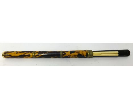 A Chinese travelling knife and chop stick set, in a tortoiseshell case.