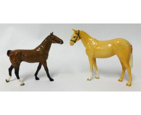 Two Beswick horses one with bridle an another horse, 16cm