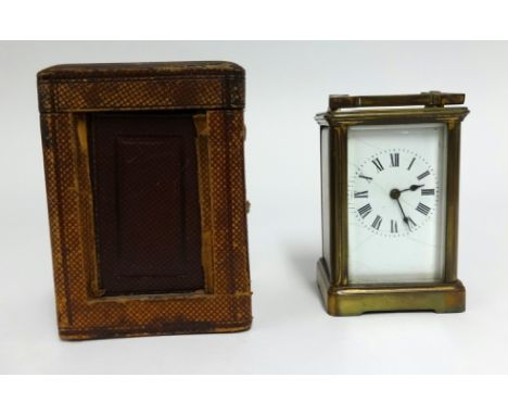 A French brass cased carriage clock with travel box (faults)