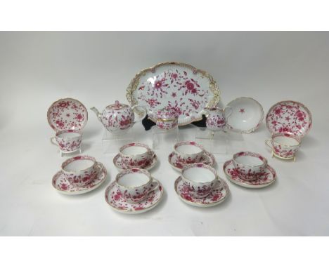 A 19th century Meissen porcelain tea service comprising 8 cups and saucers, tea pot, sugar basin, slop bowl, cream jug and tr