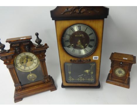 An oak cased cuckoo clock and another.