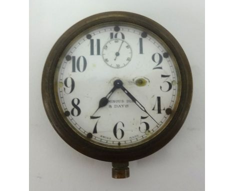 Eight day dash board clock with arabic numerals sub second dial, diameter 7cm, with leather case