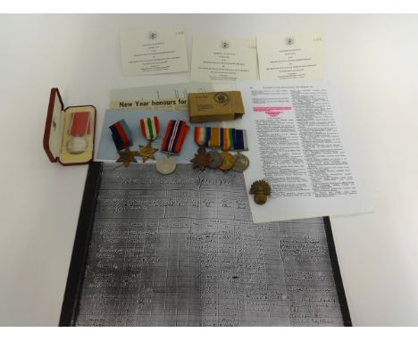 Great War and WWII medals awarded to father and son, comprising three WWI medals and a Long Service Medal awarded to K.9094 T