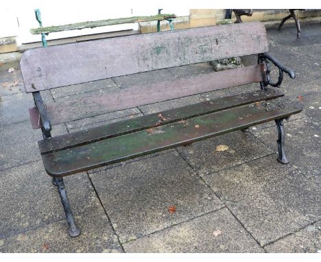 A Victorian Cast Iron Garden Bench, late 19th/early 20th century, the end supports as trailing branches supporting four weath