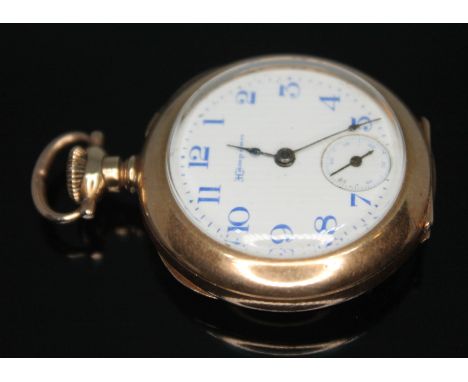 A 1901 gold plated Hampden ladies pocket watch having white enamel signed dial, spade hands, Arabic numerals in blue and seco