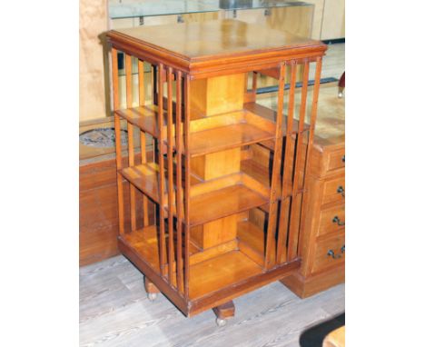 A light oak revolving bookcase circa 1900, height 113.5cm.  
