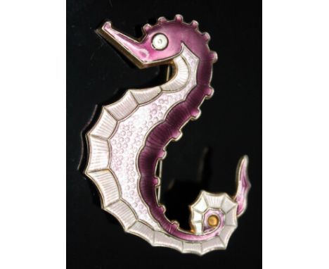 A Norwegian silver gilt and enamel brooch formed as a seahorse with pink and purple basse-taille enamels by David Andersen, m