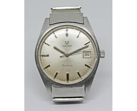 A 1969 Omega Genéve ref.136.041 stainless steel wristwatch having champagne signed dial, baton hands and hour markers inset w