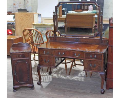 A good quality Chippendale style reproduction mahogany dressing table circa 1920s with swing mirror supported by four pillar 