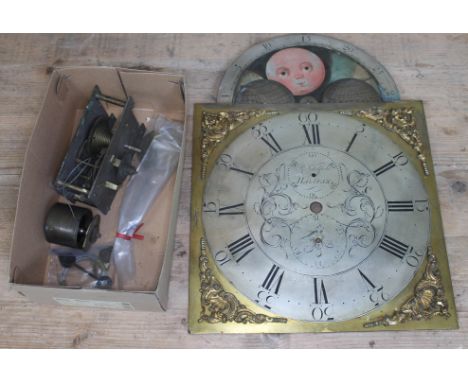 A brass and silvered rolling moon clock dial signed R Schofield Halifax, 34.5cm x 48.5cm, together with a fusee clock movemen