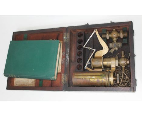 A cased Casartelli &amp; Potter's steam engine indicator with book.  