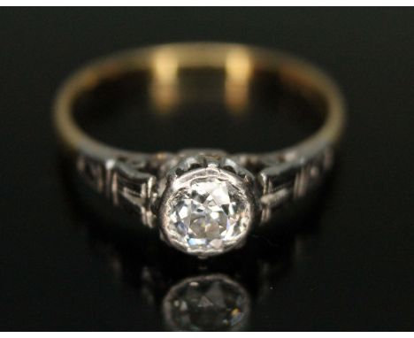 A single stone diamond solitaire ring, the bezel set Old European cut stone weighing approx. 0.43 carats, band marked '18ct P