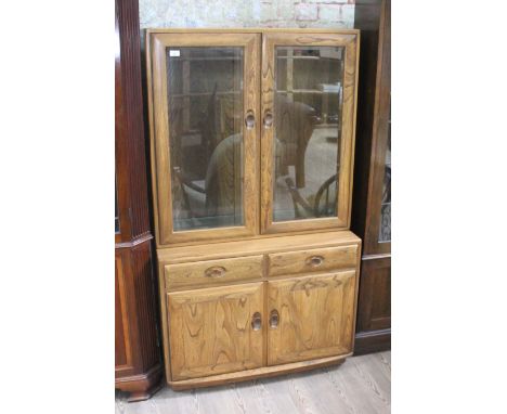 A modern Ercol glazed display cabinet.  Excellent condition.