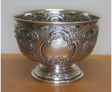 An Irish silver bowl, repousee decoration, pedestal foot, Dublin 1950, diameter 13.5cm, wt. 7 1/2ozt. 