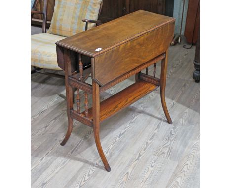 A late Victorian oak Sutherland table with splayed legs.Good overall condition, some general wear to include light surface ma