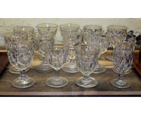 A group of fourteen Victorian pressed glass pedestal rummers.  