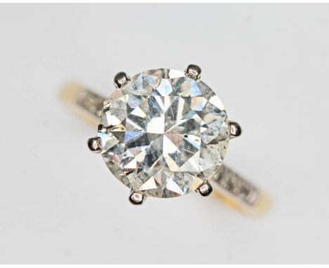 A diamond solitaire ring, the six claw set early round brilliant cut stone weighing approx. 2.52 carats, colour K, clarity I1