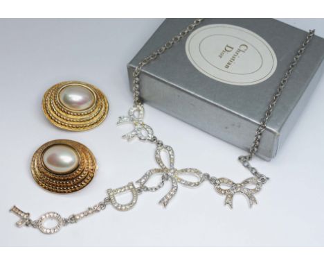 Vintage Christian Dior jewellery comprising a 'DIOR' drop pendant necklace length 42cm and a pair of clip on earrings, one bo