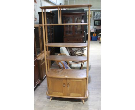 An Ercol light elm 'Giraffe' room divider.  Good overall, some light surface marks.