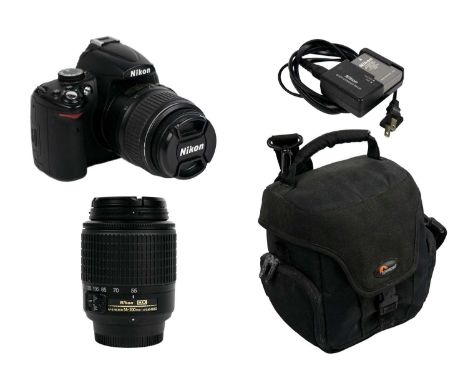 A Nikon D5000 fitted with a Nikon DX AF-S Nikkor ED 18-55mm lens. Together with a Nikon DX AF-S 55-200mm lens, Nikon Quick Ch