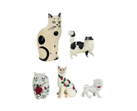 A P Rada pottery floral cat figurine.  Height 14cm. Together with four other ceramic and pottery cat figurines.