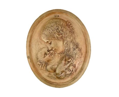 A terracotta wall plaque of oval form, decorated in relief with the portrait of a mother and child.  Height 50.5cm, width 41.
