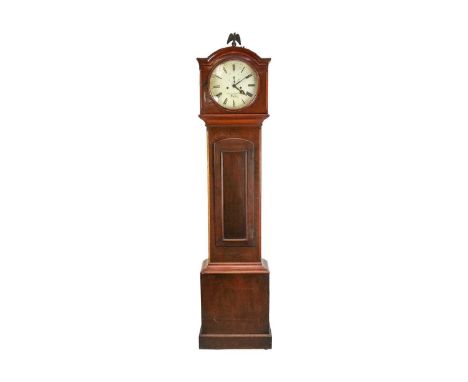 A late George III Irish mahogany eight-day longcase clock. The white circular 30cm(12") dial signed Chancellor &amp; Co Dubli